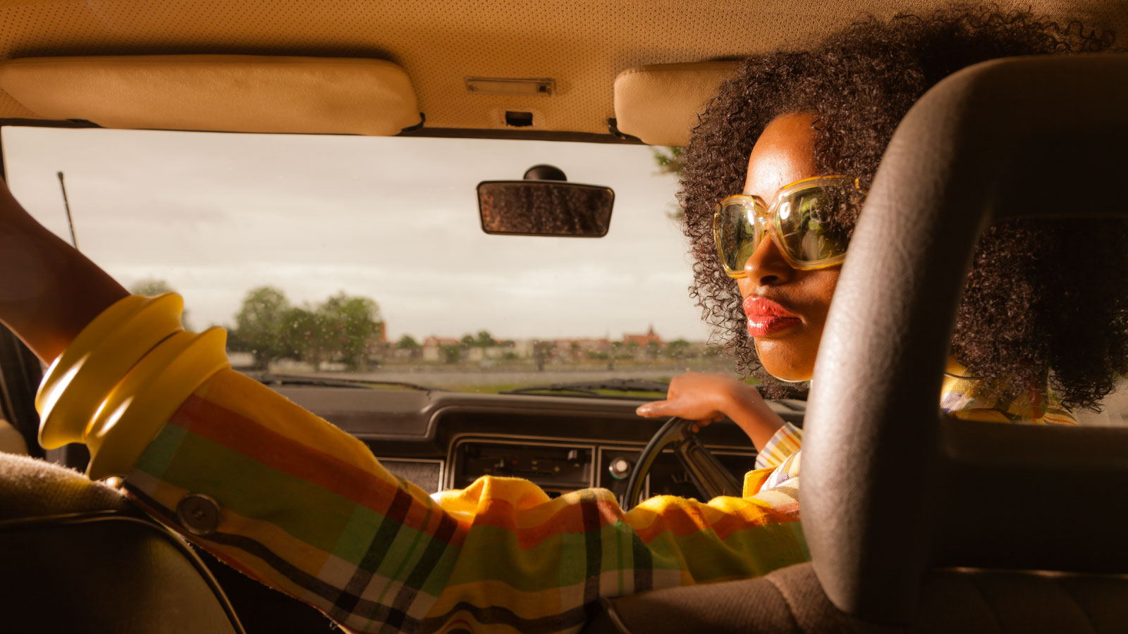 70s afro girl with retro glasses.