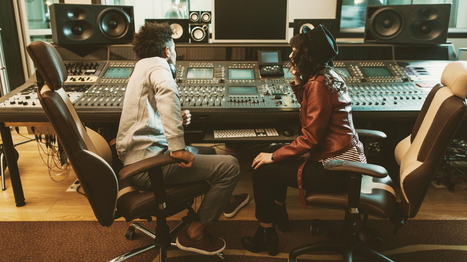 Pop music producers on the sound recording studio